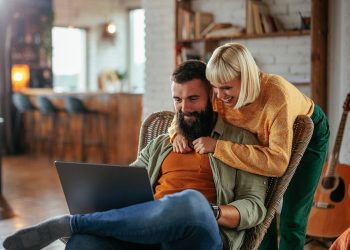 man and women on laptop