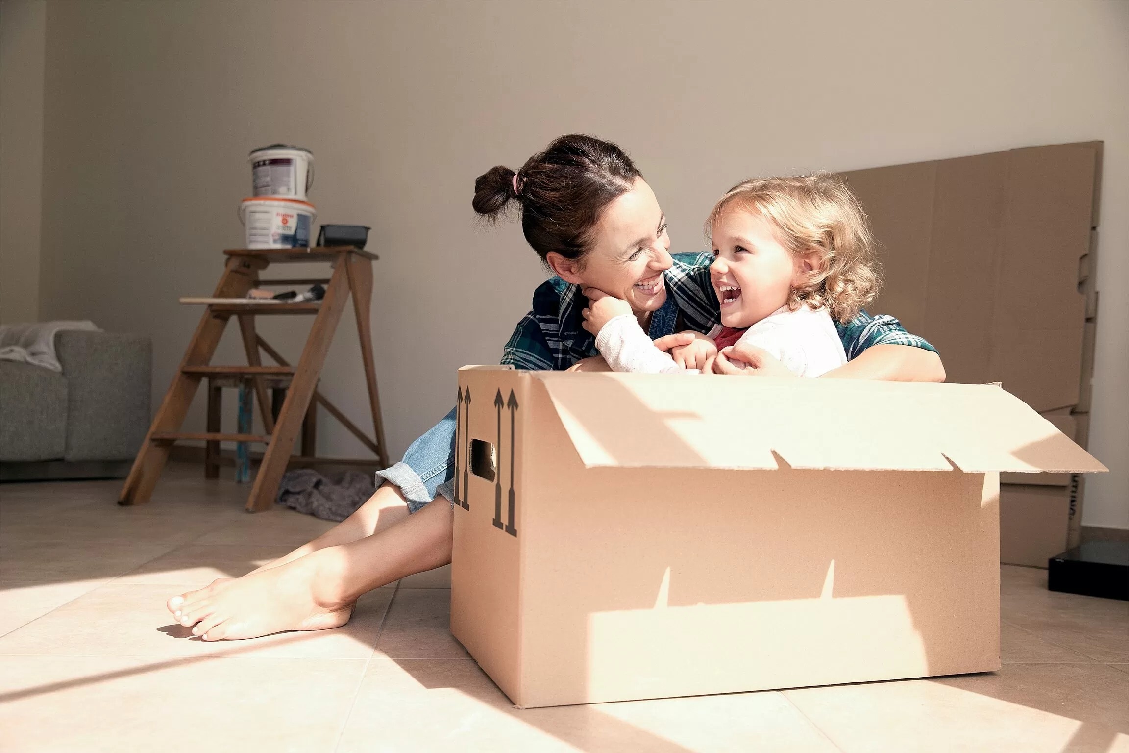 Mom and child in a box