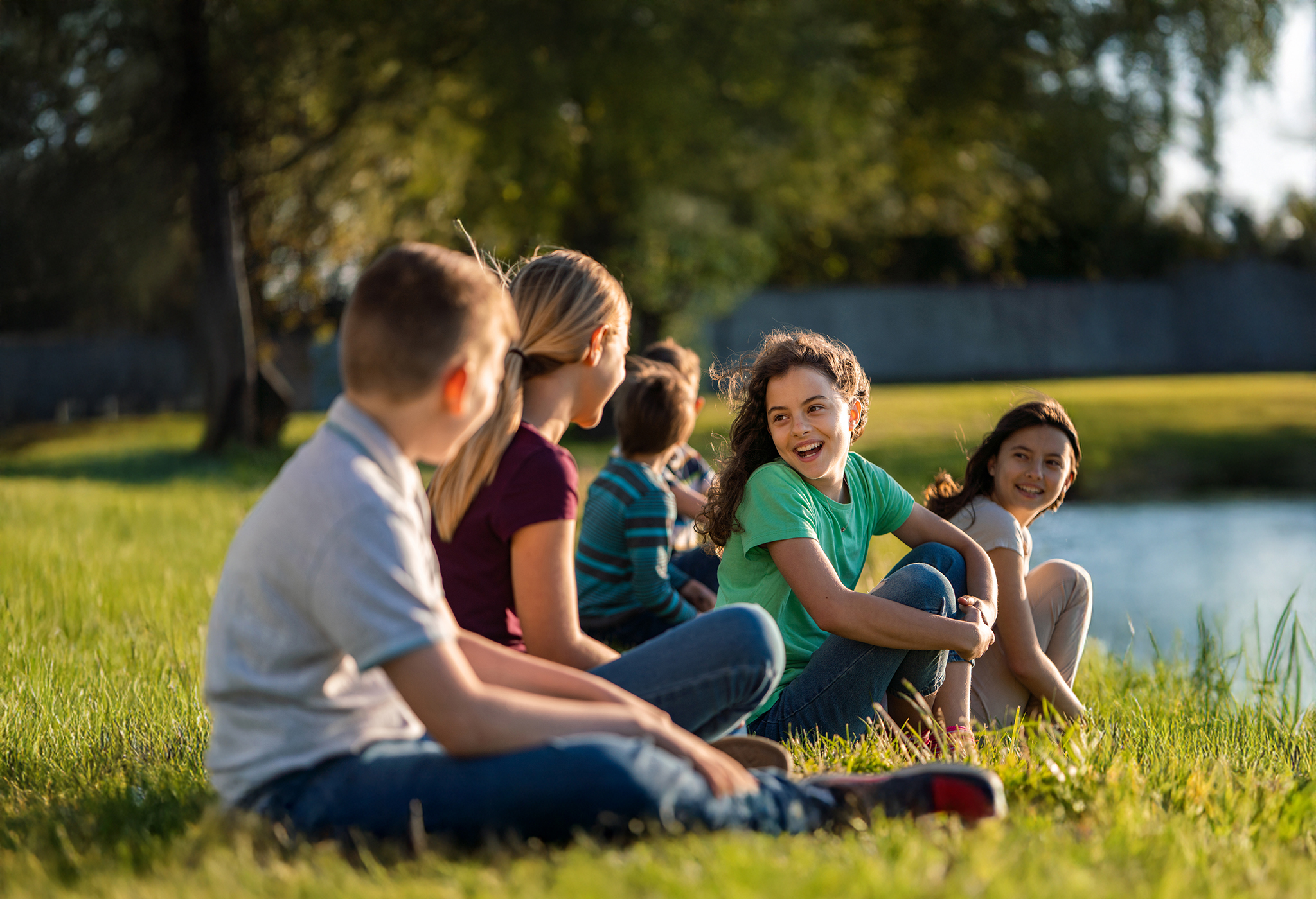 Group of children playing grass